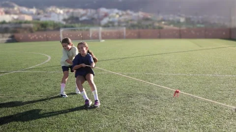 Group of children training and playing tug of war rope games. Kids having fun  Stock Footage 261546731