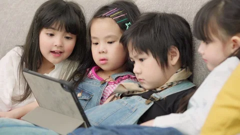 Group of children using tablet in classroom. Video stock 110267135