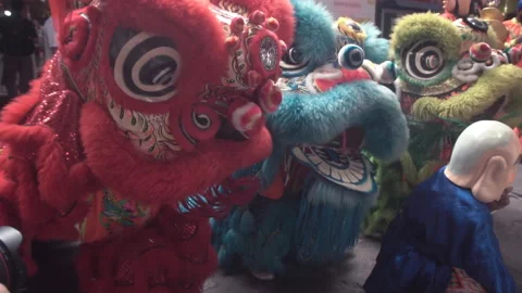 Group of Chinese lion performing during Lunar new year festival in Chinatown. Video stock 166854994