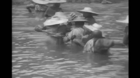 Group of Chinese men pull heavy load uphill in 1943. Stock Footage 152666840