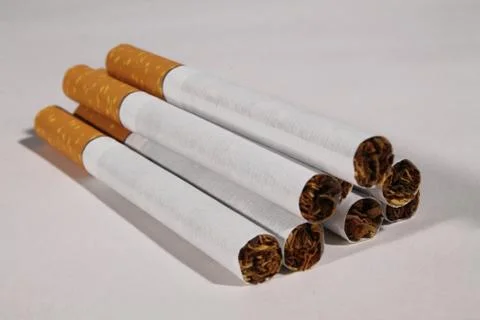 Group of cigarettes on white background Stock Photos