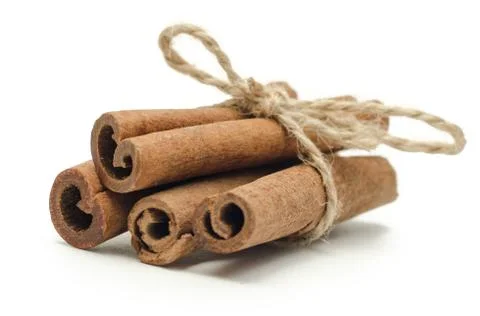 Group cinnamon, close up, isolated on white background Stock Photos