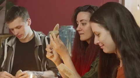 Group class on making glasses from clay. Stock Footage 246005775