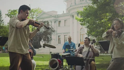 Group of Classical Musicians Busking in Park Stock Footage 280676086