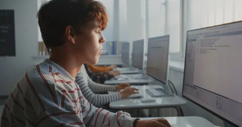 Group of Classmates In Bright Lab Learning Game Development and Modern Software Stock Footage 318517684