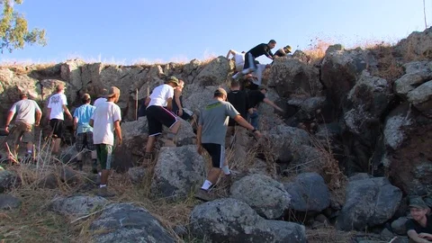 Group climbing hill Stock Footage 89480041