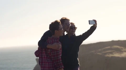 Group Of Close Friends Take Fun Vacation Selfies Together On The Oregon Coast Stock Footage 77288394