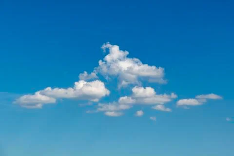 Group of clouds floating in the blue cyan pur gradient color sky at the early Stock-Fotos