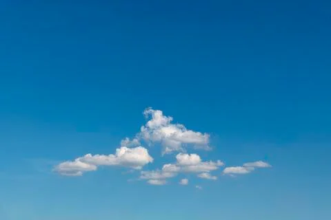 Group of clouds floating in the blue cyan pur gradient color sky at the early Stock-Fotos