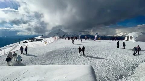A group of clouds in the sky over a snow covered slope Stock Footage 255729450