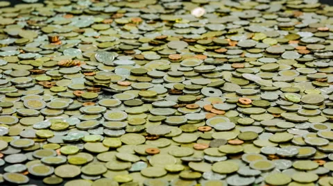 Group of coins close up rotation as the background. Video stock 59877620