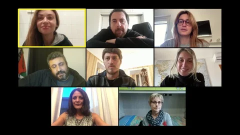 A group of colleagues chatting by zoom talking about work Stock Footage 129573205