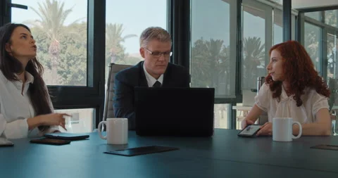 A group of colleagues talking about a new project, sharing ideas Stock Footage 139916570