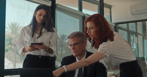 A group of colleagues talking about a new project, sharing ideas Stock Footage 139920615
