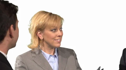 A group of colleagues talking and working in a meeting. Stock Footage 34663277