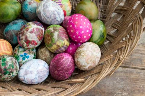 Group of colorful Easter eggs in a basket Foto stock