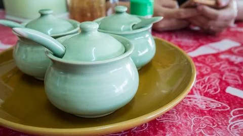 Group of  condiment  bowl on table Stock Photos