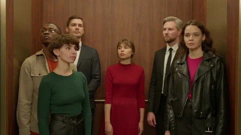 Group of confused people stuck in the elevator Stock Footage 221623513