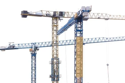 Group of construction cranes Stock Photos