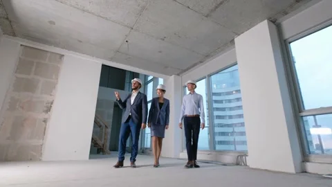 Group of construction workers checking building Stock Footage 245237833