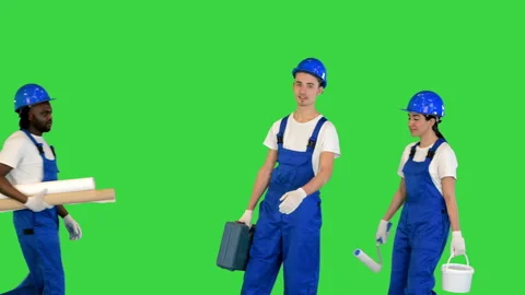 Group Of Construction Workers Meet And Smile To Camera on a Green Screen, Chroma Stock Footage 156980686