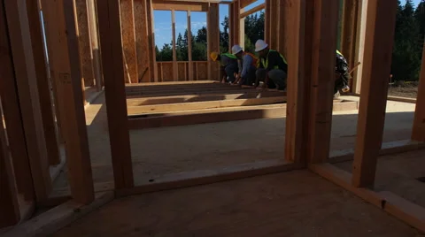 Group of construction workers staning up wall Stock Footage 47531831