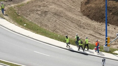 Group of Construction Workers Walking Stock Footage 80747587