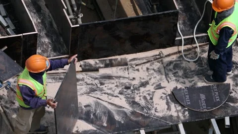 Group of construction workersworking on a building framework. Stock Footage 320516536