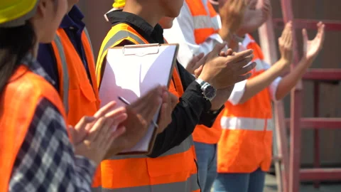 Group of Containers worker excited and applauding in morning meeting . group Stock Footage 157715877