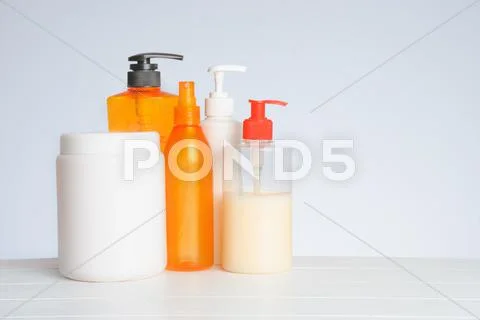 Group of cosmetic bottles isolated on white Stock Photos