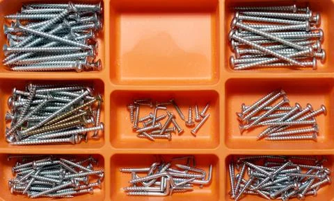 Group of countersunk lag screws in a box Stock Photos