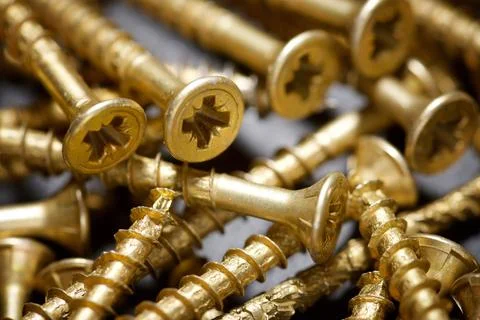 Group of countersunk lag screws on a table Fotos de archivo