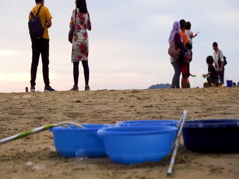 Group of couple chatting at the beach Stock Footage 129138726