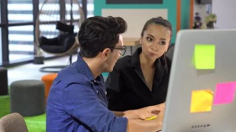 Group of creative brainstorming together wiht computer in the meeting room . Stock Footage 112730205