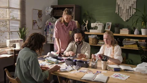 Group of Creative People Learning Patchwork in Craft Workshop Stock Footage 341941428