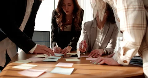 Group of creative people working men and women in the office brainstorming Stock Footage 227024122