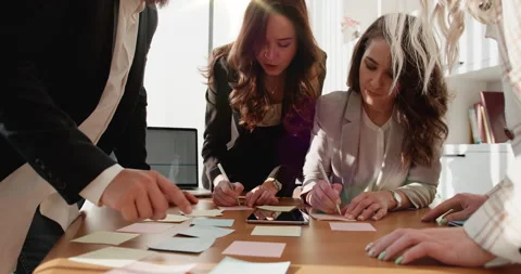 Group of creative people working men and women in the office brainstorming 库存影片 227024268