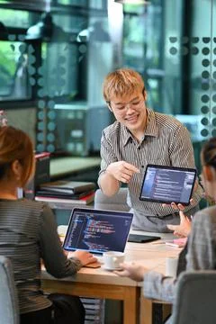 Group of creative software development sharing creative idea, working with coded 스톡 사진