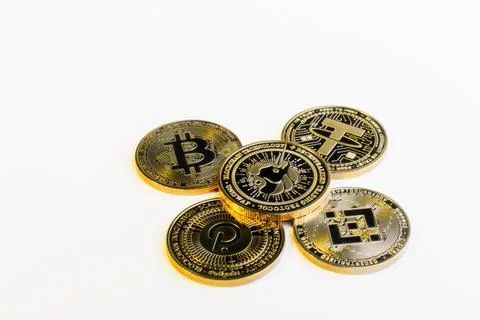 Group of Cryptocurrency Physical Coins on Clean White Background Foto stock