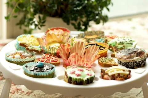 Group of cupcakes and biscuits Stock Photos