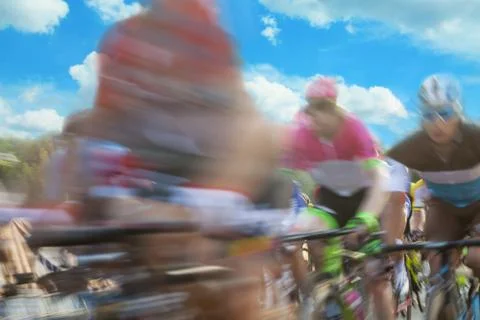 Group of cyclist during a race, motion blur Stock Photos