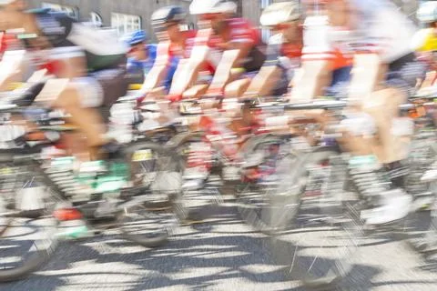 Group of cyclist during a race, motion blur Stock Photos