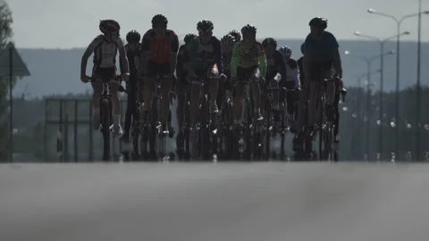A group of cyclists are driving along the road Stock Footage 86456992
