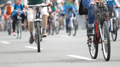 A group of cyclists  in a blurred Stock Footage 64537197