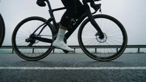 A group of cyclists competes with each other in a mountain race. Bicycle race Stock Footage 262105109