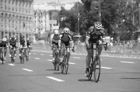 Group of cyclists making spurt during the cycle race. Competition among amateurs Stock Photos