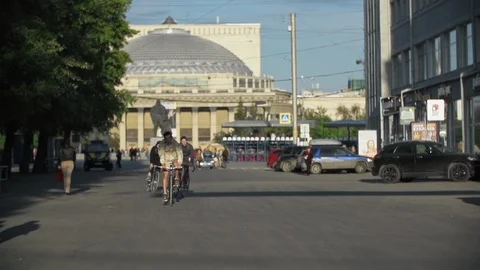 Group of cyclists ride fixie bicycles at city street. Ecological urban transport Stock Footage 108317305