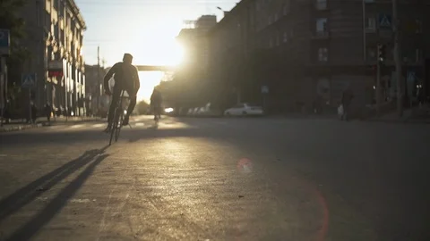 Group of cyclists riding fixed gear bicycles at street. Eco-friendly transport Stock Footage 108349035