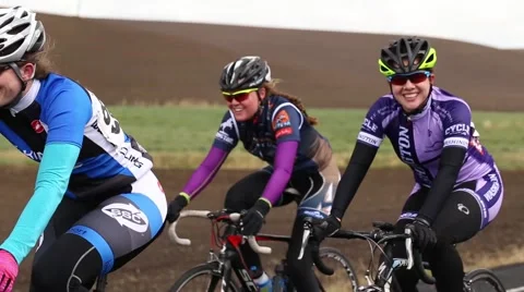 Group of cyclists riding up a hill Stock Footage 50452813