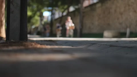 Group of Cyclists Riding in the Park on a Blurred Background. Slow Motions. 4 Stock Footage 287589096